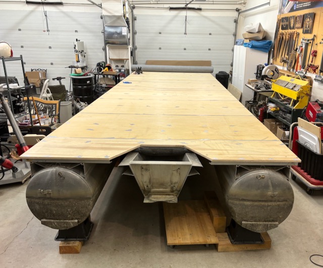 New deck installed: eight 4 x 8 sheets of Marine Plywood plus stainless steel fasteners were required.